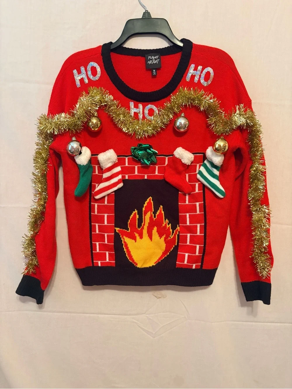 Red Holiday Fireplace Sweater with Tinsel and Stockings